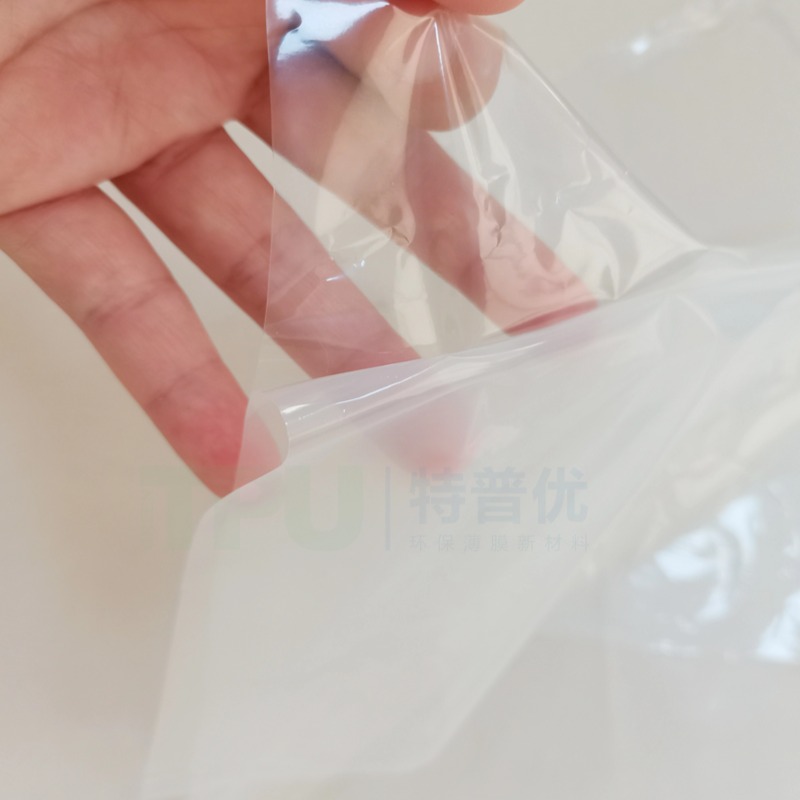 High-adhesion TPU hot melt film for fabric lamination featuring strong bonding elasticity and waterproof properties ideal for outdoor clothing and luggage materials