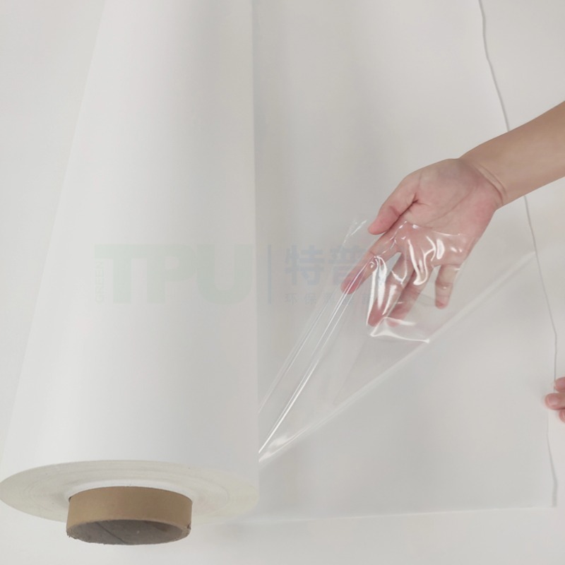 Transparent TPU film used for automotive headliners bonding fabric to substrate providing flexible durable and high quality material for interior applications